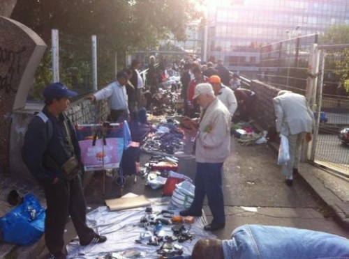 Les biffins (waste pickers) selling their reclaimed materials at the Marche aux Puces (Street Market) in Paris. Credit: Associacion Amelior.