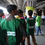 Waste pickers listen as the Station Master thanks them for their work. Photo credit: Chintan.