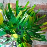 Green plastic material that looks like leaves or flowers.