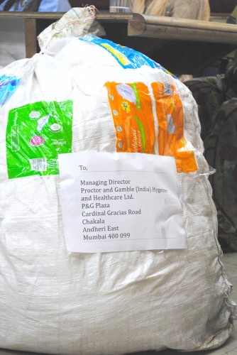 A bag full of used sanitary napkins address to Proctor and Gamble, one of the companies that manufactures the product. Photo credit: SWaCH.