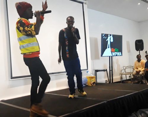 Solomon featuring Dash Johnte singing "Recognition, integration and service fee" at NAirobi, Kanya during INC-3. 2023